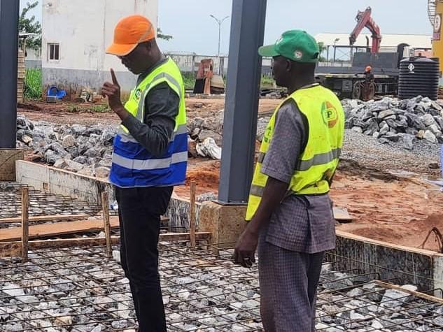 Construction workers reviewing plans